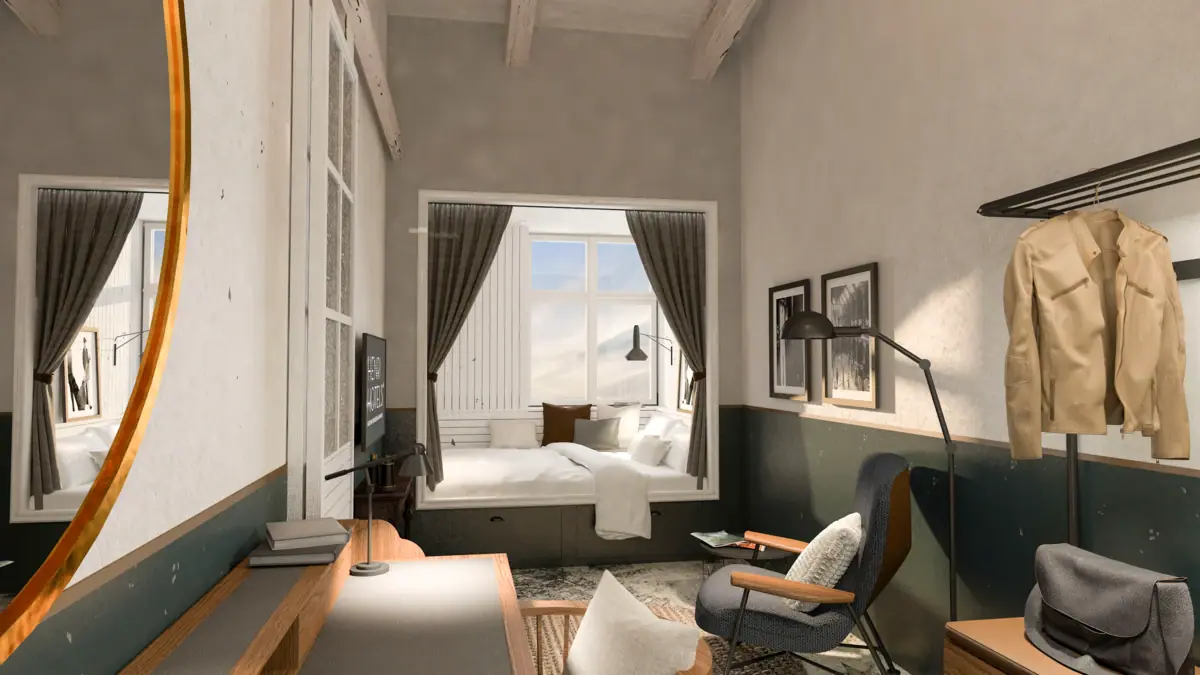 Innenansicht eines Hotelzimmers im HENRI Hotel Cuxhaven mit einem Bett, Tisch und Stühlen.