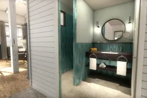 Badezimmer mit rundem Spiegel und Waschbecken